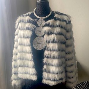 Faux fur fashion coat. black and white, like new.